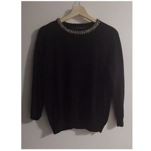 Sweater with embellishment